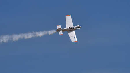 Ferrara Italy JUNE, 27, 2021 Plan profile of a small propeller aerobatic plane in the perfectly blue...