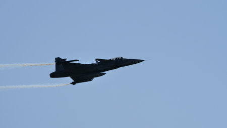 Maribor Slovenia AUGUST, 15, 2021 War military airplane in flight at high speed. SAAB JAS-39 Gripen...