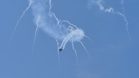 Maribor Slovenia AUGUST, 15, 2021 Air Force fighter jet releases flares anti infra red heat guided...