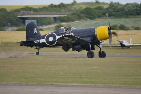 Duxford England Flying Legends Air Show JULY, 11, 2015 Chance Vought F4U Corsair. The F4U Corsair is a United States carrier based fighter aircraft used in World War II and the Korean War.のeditorial素材