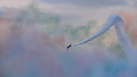 Rivolto del Friuli Udine Italy SEPTEMBER, 17, 2021 Aerobatic plane with white trail in the sky still...