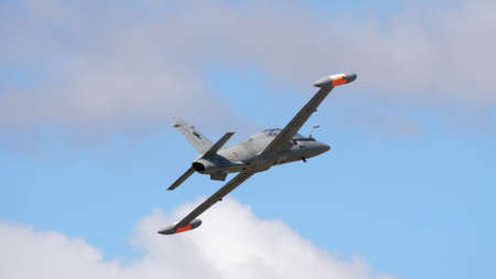 Rivolto del Friuli, Udine, Italy SEPTEMBER, 17, 2021 Aermacchi MB-339 military jet training and light attack airplane of Italian Air Force in the blue sky painted in NATO greyのeditorial素材