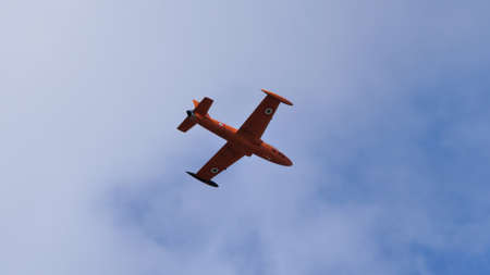 Rivolto del Friuli Italy SEPTEMBER, 17, 2021 Vintage military training jet aircraft in flight in blue sky. Aermacchi MB-326 by Volafeniceのeditorial素材