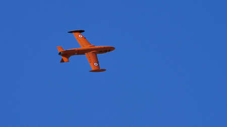 Rivolto del Friuli Italy SEPTEMBER, 17, 2021 High visibility, military jet plane in flight with completely blue sky background. Aermacchi MB-326 by Volafeniceのeditorial素材