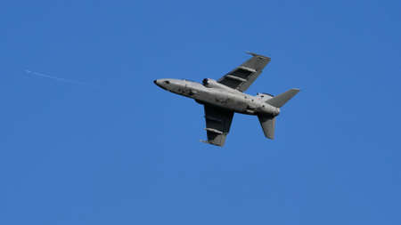 Thiene Italy OCTOBER, 16, 2021 Ground attack airplane in flight armed in the blue sky. Copy Space....