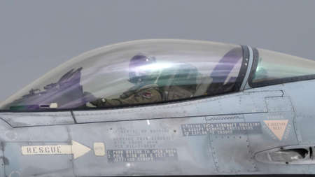 Andravida Greece APRIL, 1, 2022 Canopy of military plane with fighter jet pilot inside. Lockheed Martin F-16 Fighting Falcon of Greece Armed Forcesのeditorial素材