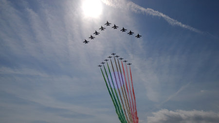 Ghedi Italy SEPTEMBER, 8, 2022 Italian flag is drawn in the sky by the red, white and green fumes of a large formation of fighter jet planes. Panavia Tornado in rare formation with Frecce Tricolori.のeditorial素材