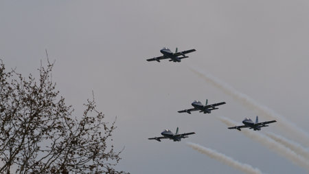 Istrana Italy April 5 2024: Military Planes in Flight in Formation at Low Altitude with Smokes....