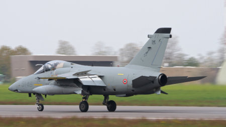 Istrana Italy April 5 2024: Combat Aircraft Landing on NATO Military Airport. Side View Close Up. AMX Ghibli of Italian Air Force. Copy Spaceのeditorial素材