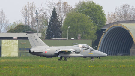 Istrana Italy April 5 2024: Fighter Jet Taxiing on Military Airport Runway. AMX Ghibli of Italian Air Force. Copy Spaceのeditorial素材