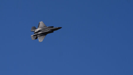 Athens Greece September 3 2023: Fighter jet maneuvering in the clear blue sky. Copy Space. Lockheed Martin F-35 Lightning II of United States Air Force.のeditorial素材