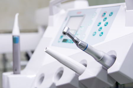Different dental tools in the dental office. Dental chair instruments. Close-up dentist tools capture.の写真素材