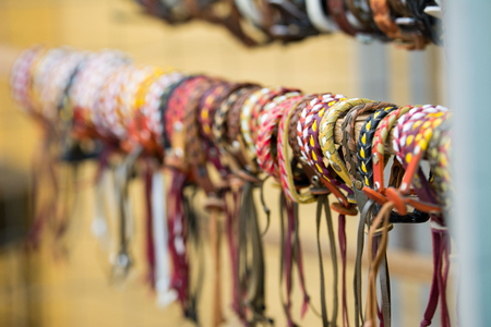 Cute handmade bracelets in a showcaseの写真素材