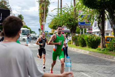 Alanya, Turkey, 10/16/2022: Man athletes from different countries run a marathon through the streets...