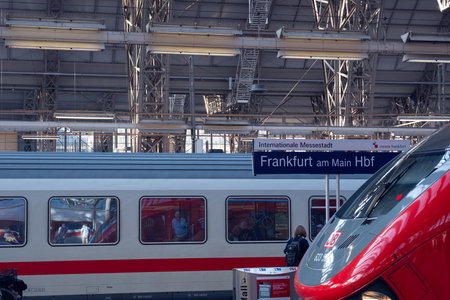 Frankfurt AM, Germany - 06.13.2023: Red modern Deutsche Bahn train at the station at Arankfurt am Main. Beautiful train close-up.のeditorial素材