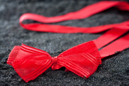 red ribbon of black sandの写真素材