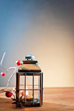lantern with the flame in Christmas ambienceの写真素材