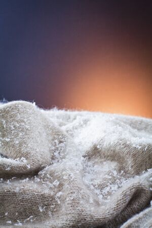 Snow placed on wool sweaterの写真素材