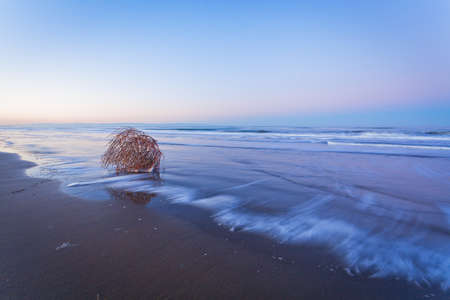 long exposure to sea and white foam 	の写真素材