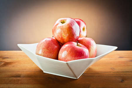 red apples on white tray の写真素材