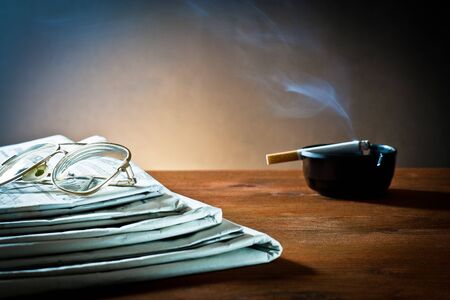 newspaper,document and cigarette for relax 