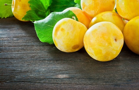 plum on woodの写真素材