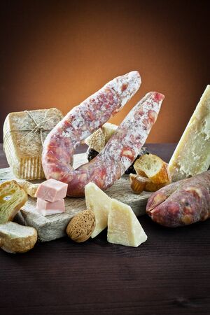 assortment of cheese and salami の写真素材