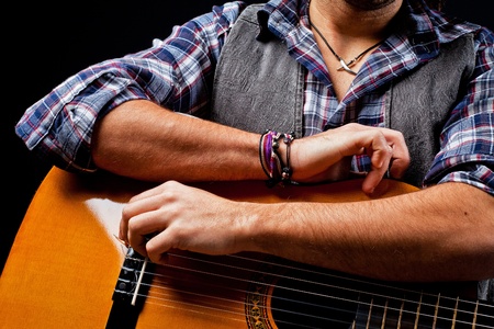 playing acoustic guitar の写真素材