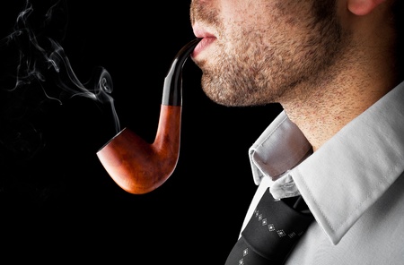 man smoking a pipe の写真素材