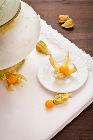 physalis in white dish towelsの写真素材
