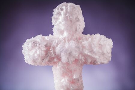 cross created with salt crystalsの写真素材