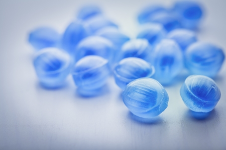 Blue candy fresh balsamic syrup on a white backgroundの写真素材