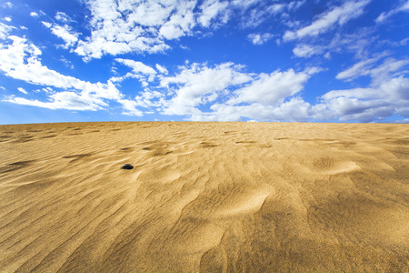 sand dunes and sky in maspalomas gran canariaの写真素材