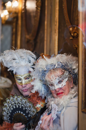 Venice, Italy - February, 2019: Carnival of Venice, typical Italian tradition and festivity with masks in Veneto.のeditorial素材