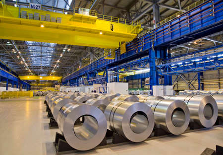 Packed rolls of galvanized steel in stock waiting for shipment
