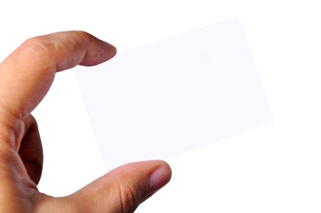 Hand holding an blank business card. Isolated background.の写真素材