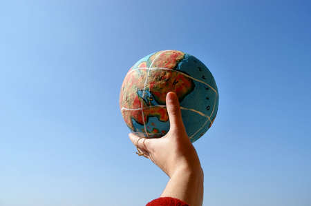 hand with a globeの写真素材