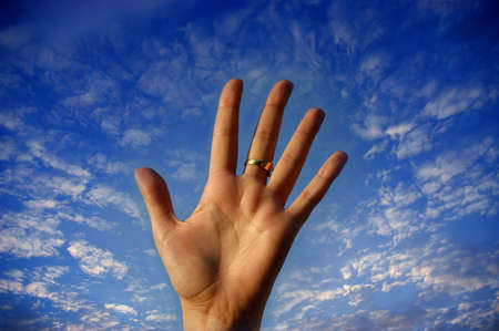 hand in the cloudsの写真素材