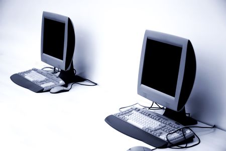 blue toned computer room with tft monitors