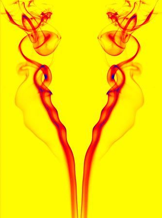 abstract colored smoke lines in a yellow backgroundの写真素材
