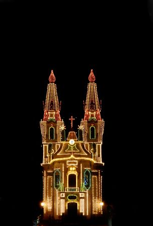 church with christmas light in the nightの写真素材