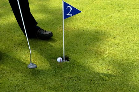 man playing golf detailの写真素材