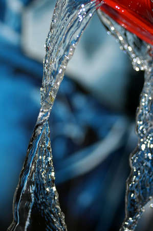 water falling from a glassの写真素材