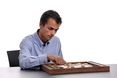 young man playing a game isolated on white