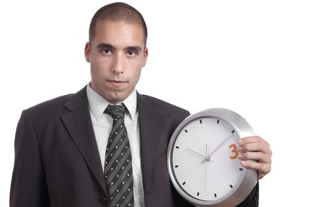 young handsome business man holding a clockの写真素材