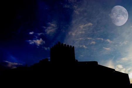 an ancient portuguese castle and the moonの写真素材