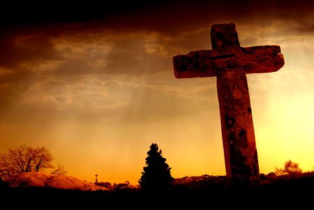 cross silhouette and the clouds at sunsetの写真素材