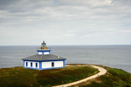 small lighthouse at the coast of north of spainの写真素材
