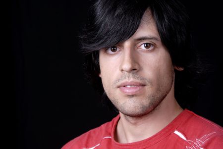 young business man portrait on black backgroundの写真素材