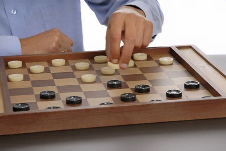 young man playing a game isolated on white